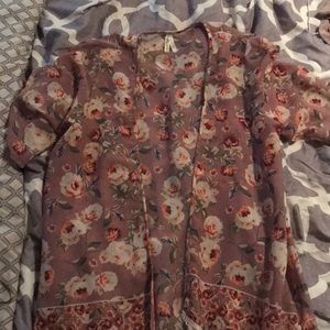 Floral duster with fringe detail.